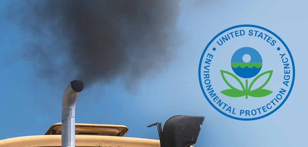 Truck with black exhaust, epa logo superimposed over blue sky